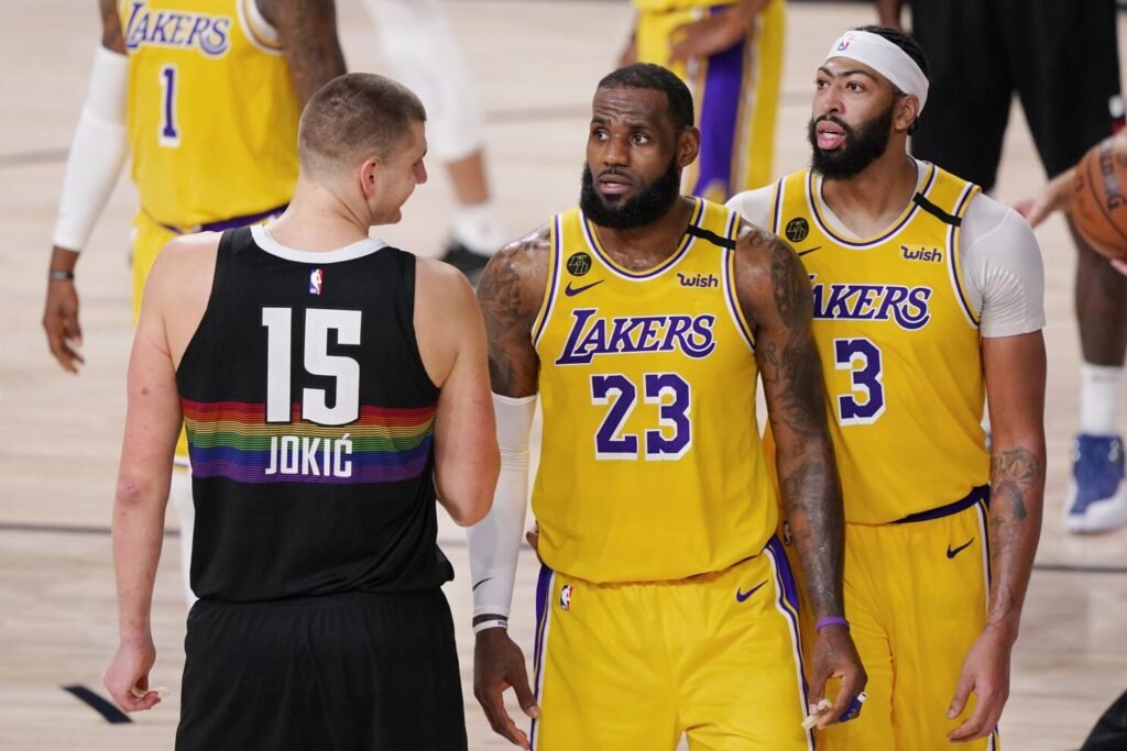 LeBron James and Nikola Jokić in Discussion LeBron James and Nikola Jokić planning a basketball league